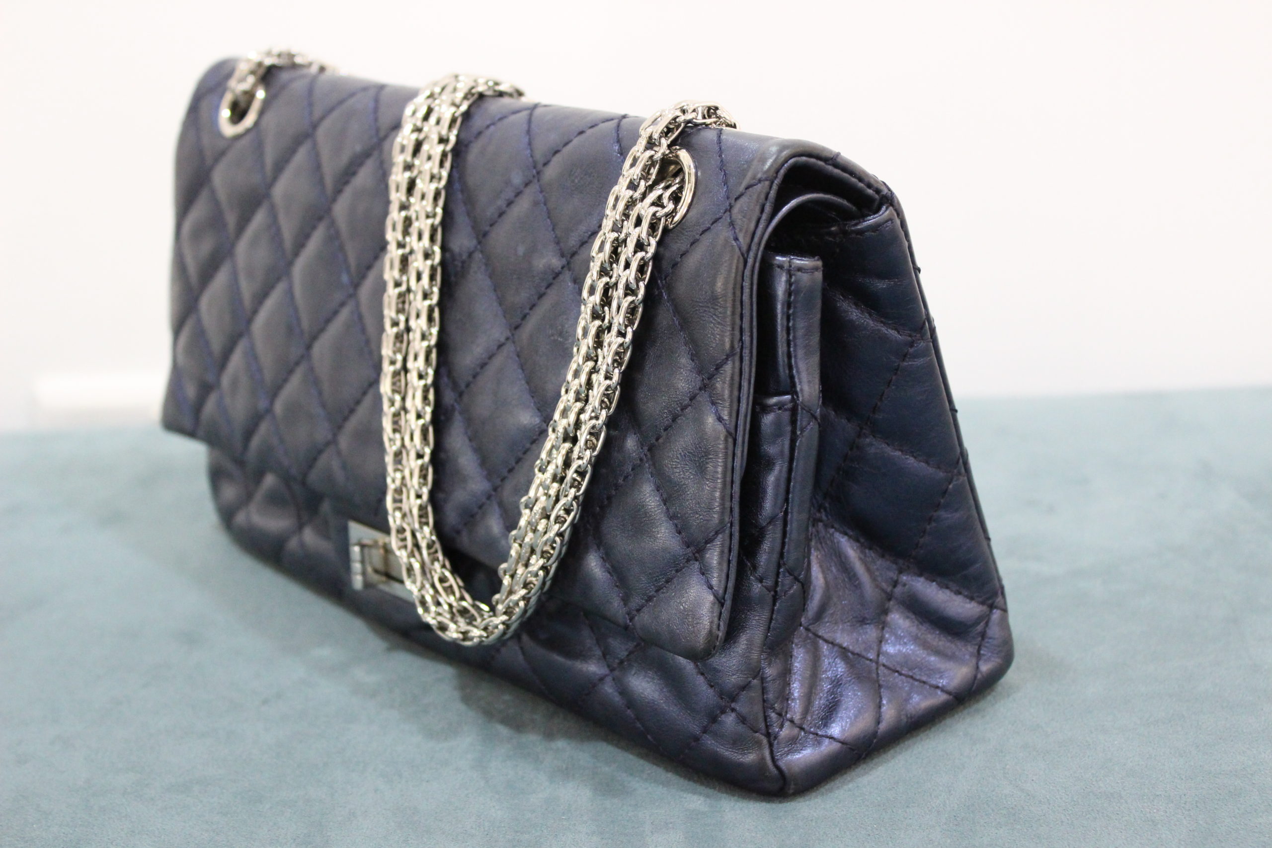 A Chanel quilted bright blue leather re-issue flap bag, …